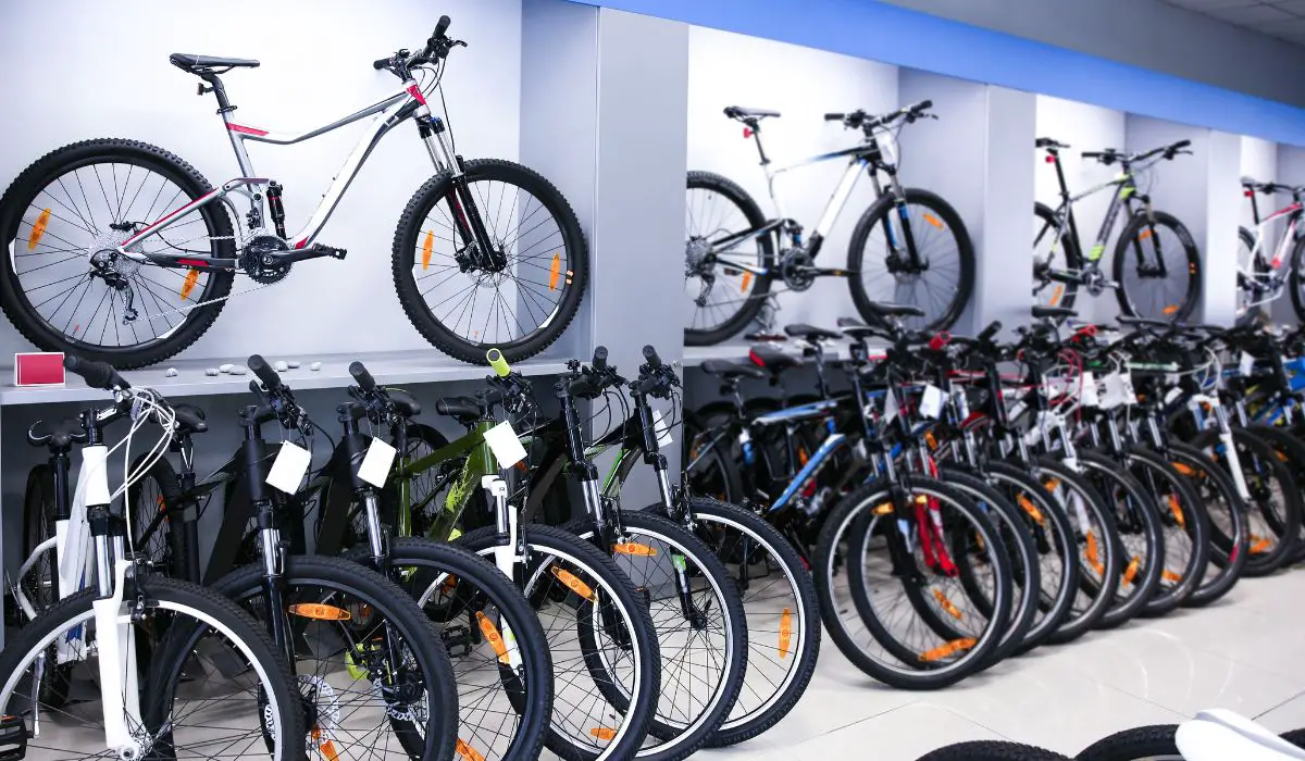 Bikes lined up for sale in a showroom. 