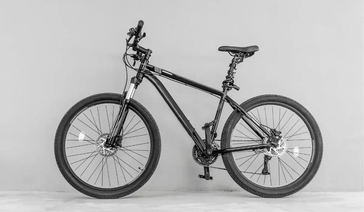 A black painted bike on a light grey background.