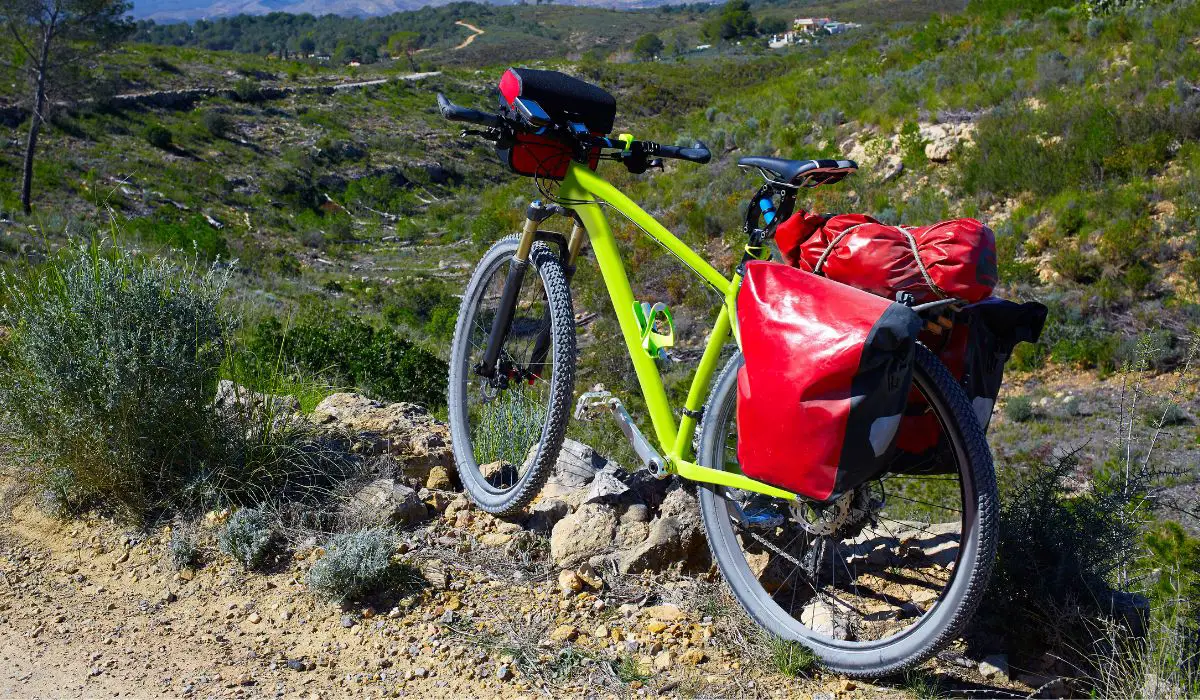 A bike with several bags filled with gear. 