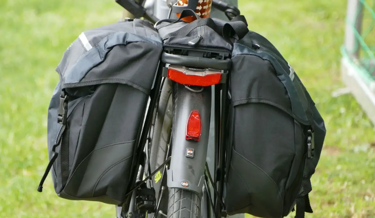 Back view of a bike with pannier bags on each side. 